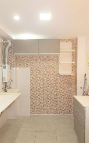 Apartamento à venda com 40m², 2 quartos e 1 vaga Apartamento à venda com 40m², 2 quartos e 1 vagaCozinha e Área de Serviço