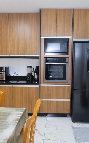 Casa à venda com 133m², 3 quartos e 2 vagas Casa à venda com 133m², 3 quartos e 2 vagasCozinha