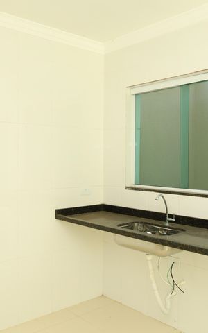 Casa de condomínio para alugar com 68m², 2 quartos e 2 vagasCozinha
