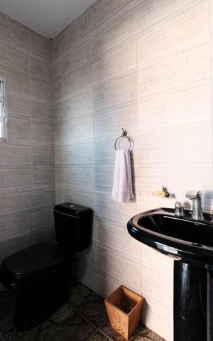 Casa à venda com 400m², 4 quartos e 4 vagasBanheiro 3