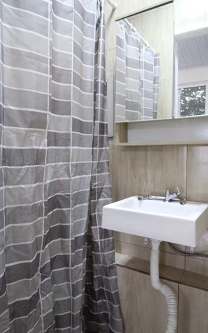 Casa para alugar com 130m², 2 quartos e 3 vagasBanheiro da Suíte 1
