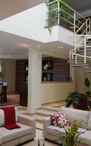Casa de condomínio para alugar com 620m², 4 quartos e 6 vagasSala de Estar