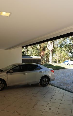 Casa de condomínio para alugar com 620m², 4 quartos e 6 vagasGaragem