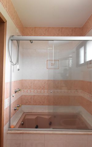 Casa de condomínio à venda com 200m², 4 quartos e 2 vagasBanheiro da Suíte 2