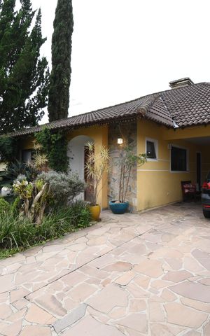 Casa de condomínio à venda com 200m², 4 quartos e 2 vagasÁrea externa - Frente