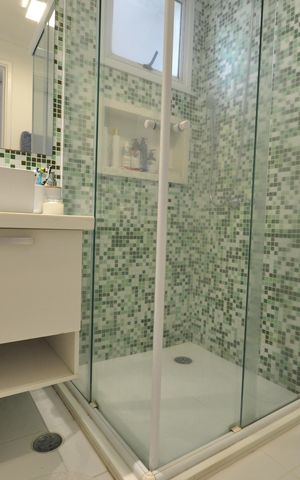 Apartamento à venda com 64m², 2 quartos e 2 vagasBanheiro do Quarto Suíte
