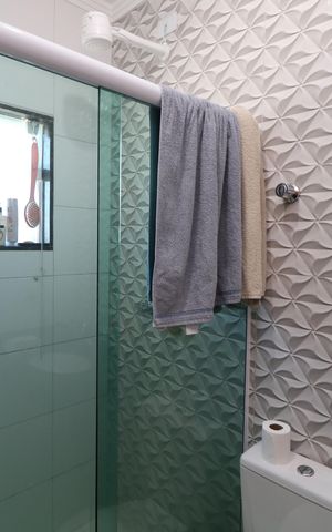 Casa à venda com 75m², 2 quartos e 2 vagasBanheiro da Suíte