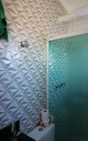 Casa à venda com 75m², 2 quartos e 2 vagasBanheiro da Suíte 2