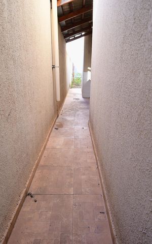 Casa à venda com 78m², 2 quartos e 2 vagas Casa à venda com 78m², 2 quartos e 2 vagasCorredor