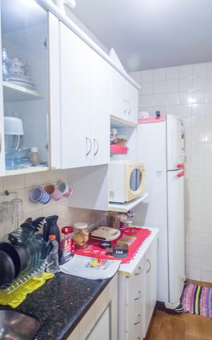 Apartamento à venda com 51m², 2 quartos e 1 vaga Apartamento à venda com 51m², 2 quartos e 1 vagaCozinha e Área de Serviço