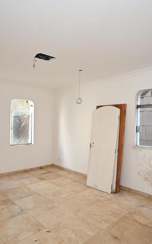 Casa à venda com 395m², 4 quartos e 5 vagasSala