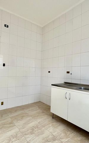 Casa à venda com 116m², 3 quartos e 1 vaga Casa à venda com 116m², 3 quartos e 1 vagaCozinha