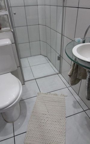 Casa à venda com 300m², 3 quartos e 3 vagasBanheiro da Suíte 1