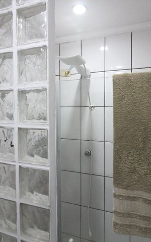 Casa à venda com 300m², 3 quartos e 3 vagasBanheiro da Suíte 1