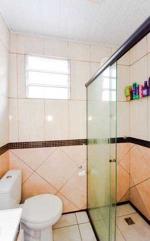 Casa para alugar com 125m², 2 quartos e 2 vagasBanheiro da Suíte 1