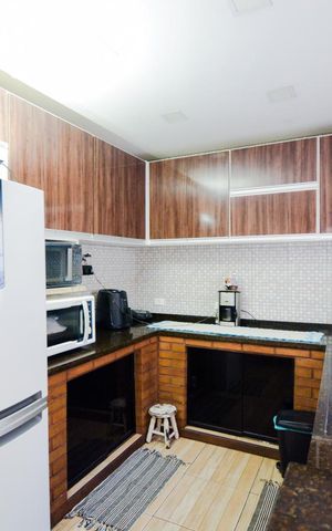 Casa para alugar com 125m², 2 quartos e 2 vagasCozinha