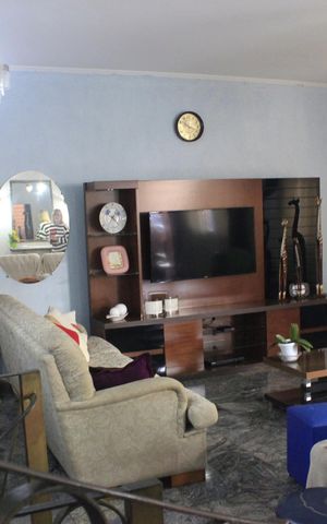 Casa à venda com 420m², 4 quartos e 4 vagasSala