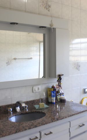 Casa à venda com 420m², 4 quartos e 4 vagasBanheiro social