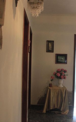 Casa à venda com 420m², 4 quartos e 4 vagasCorredor dos quartos