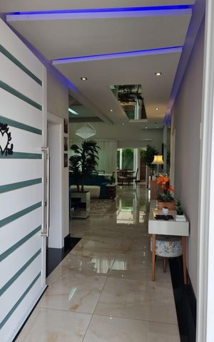 Casa de condomínio para alugar com 400m², 4 quartos e 4 vagas Casa de condomínio para alugar com 400m², 4 quartos e 4 vagasEntrada