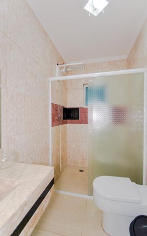 Casa à venda com 318m², 4 quartos e 2 vagasBanheiro da Suíte