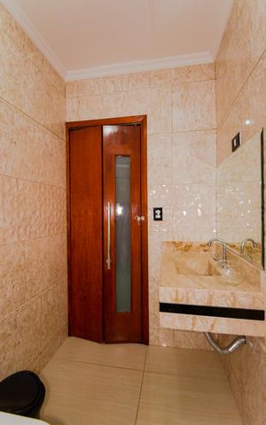 Casa à venda com 318m², 4 quartos e 2 vagasBanheiro da Suíte
