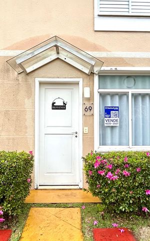Casa de condomínio à venda com 120m², 2 quartos e 2 vagas Casa de condomínio à venda com 120m², 2 quartos e 2 vagasPlaca instalada na fachada do imóvel