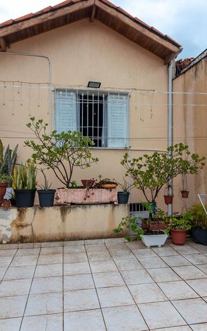 Casa à venda com 161m², 4 quartos e 1 vagaVaranda e Quintal Frontal
