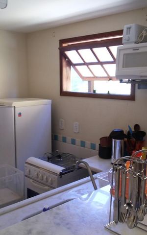 Casa de condomínio para alugar com 70m², 2 quartos e 1 vagaCozinha