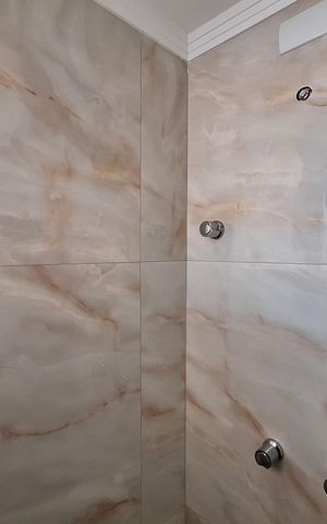 Apartamento à venda com 60m², 2 quartos e 2 vagas Apartamento à venda com 60m², 2 quartos e 2 vagasBanheiro da Suíte
