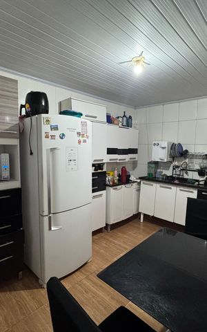 Casa à venda com 144m², 3 quartos e 3 vagas Casa à venda com 144m², 3 quartos e 3 vagasCozinha