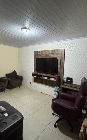 Casa à venda com 144m², 3 quartos e 3 vagas Casa à venda com 144m², 3 quartos e 3 vagasSala