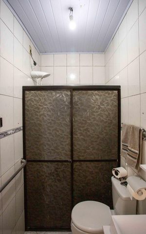 Casa à venda com 275m², 3 quartos e 2 vagasBanheiro