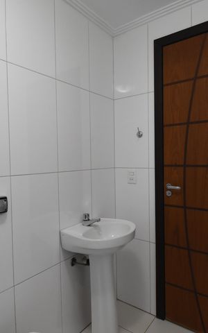 Casa de condomínio à venda com 346m², 4 quartos e 4 vagasBanheiro de serviço