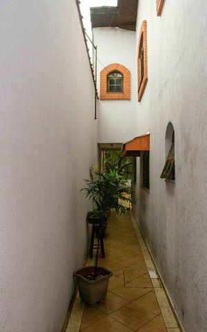 Casa à venda com 130m², 4 quartos e 2 vagasCorredor