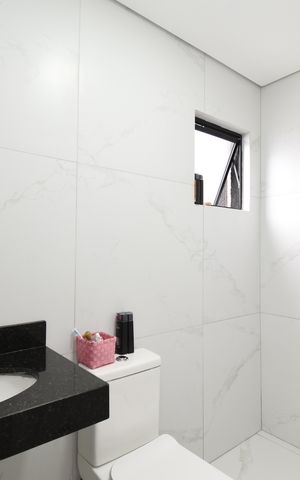 Casa à venda com 100m², 3 quartos e 2 vagasBanheiro da Suíte
