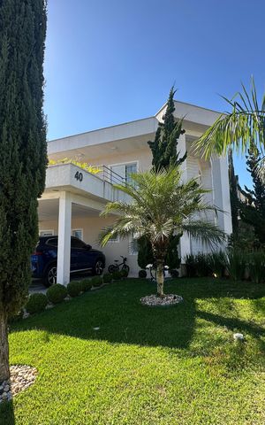 Casa de condomínio para alugar com 320m², 3 quartos e 6 vagas Casa de condomínio para alugar com 320m², 3 quartos e 6 vagasFachada