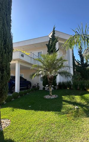 Casa de condomínio para alugar com 320m², 3 quartos e 6 vagas Casa de condomínio para alugar com 320m², 3 quartos e 6 vagasFachada