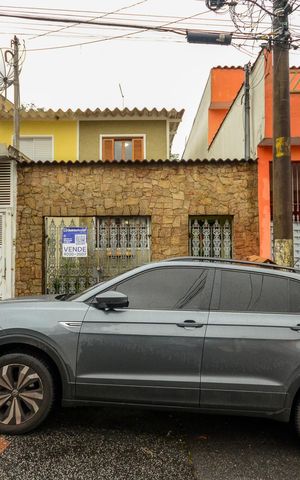 Casa à venda com 120m², 3 quartos e 3 vagas Casa à venda com 120m², 3 quartos e 3 vagasFachada