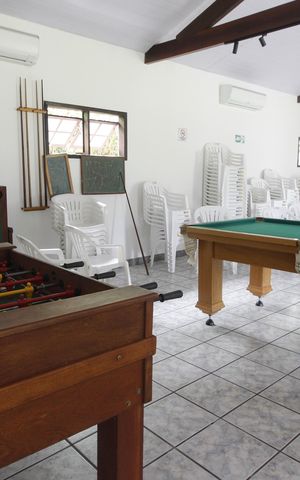 Casa de condomínio para alugar com 200m², 4 quartos e 2 vagasSala de Jogos
