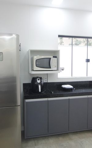 Casa de condomínio para alugar com 200m², 4 quartos e 2 vagasCozinha