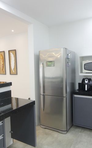 Casa de condomínio para alugar com 200m², 4 quartos e 2 vagasCozinha
