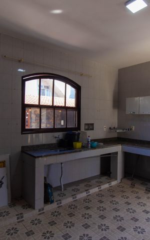Casa à venda com 143m², 2 quartos e 3 vagasCozinha e Área de Serviço