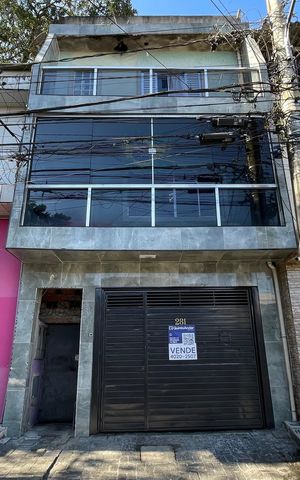 Casa à venda com 120m², 5 quartos e 2 vagasFachada + Placa