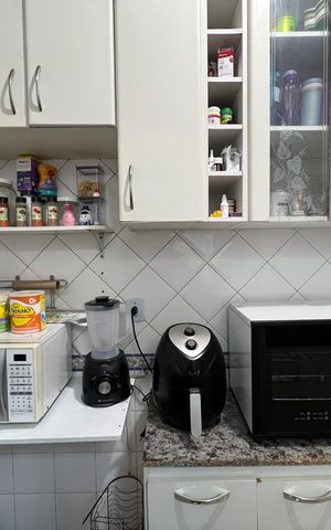 Casa à venda com 210m², 3 quartos e 2 vagas Casa à venda com 210m², 3 quartos e 2 vagasCozinha - Armários