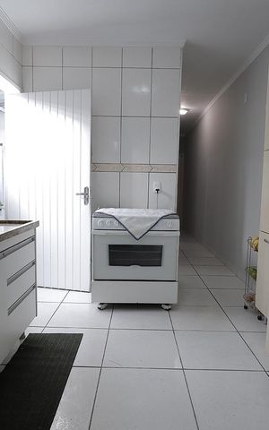 Casa à venda com 90m², 2 quartos e 2 vagas Casa à venda com 90m², 2 quartos e 2 vagasCozinha
