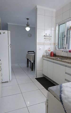 Casa à venda com 90m², 2 quartos e 2 vagas Casa à venda com 90m², 2 quartos e 2 vagasCozinha