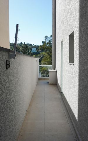 Casa de condomínio para alugar com 370m², 4 quartos e 4 vagasCorredor