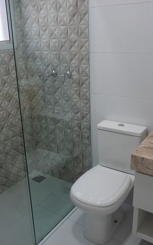 Casa de condomínio para alugar com 370m², 4 quartos e 4 vagasBanheiro da Suíte 1