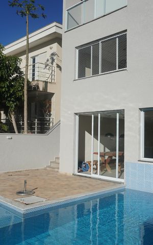 Casa de condomínio para alugar com 370m², 4 quartos e 4 vagasPiscina